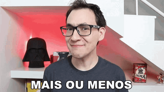 a man wearing glasses says mais ou menos in a foreign language
