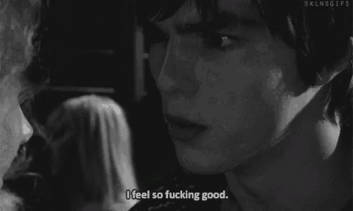 a close up of a person 's face with the words `` i feel so fucking good '' written on it .