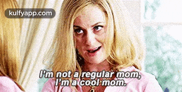 a woman is saying that she is not a regular mom and is a cool mom .