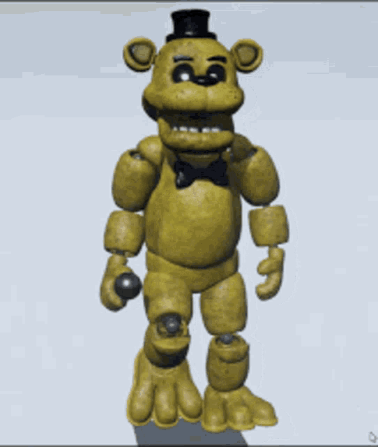 a golden teddy bear with a black top hat and bow tie