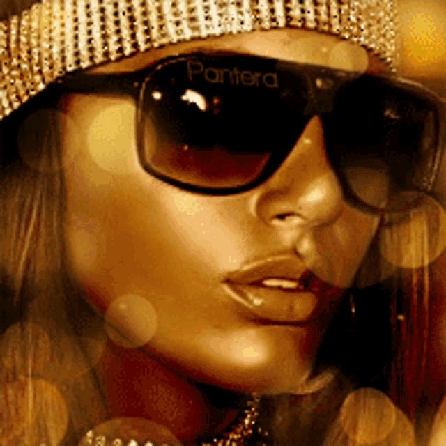 a woman wearing sunglasses and a hat with the word pantera on the lens
