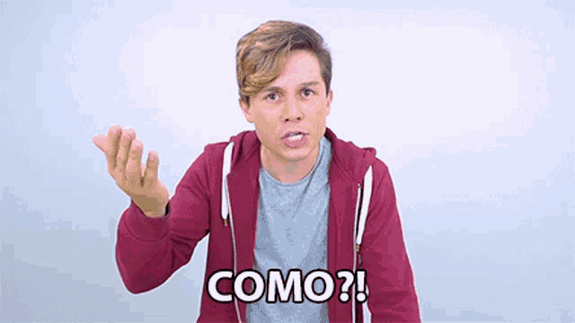 a man wearing a maroon hoodie says " como "