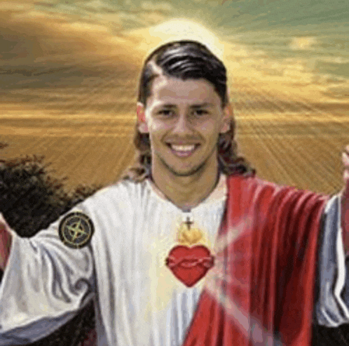 a man dressed as jesus with a red robe and a heart on his chest .