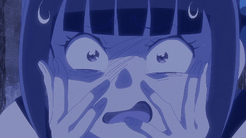 a close up of a person 's face with their hands on their face