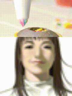 a pixelated image of a woman 's face with a rainbow colored marker on top of her head