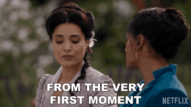 a netflix advertisement shows two women talking and says from the very first moment