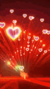 a bunch of hearts are coming out of the ground