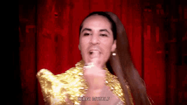 a woman in a gold dress is singing and says " sergi myself " .