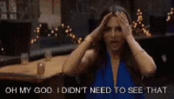 a woman in a blue dress is saying oh my god i didn 't need to see that