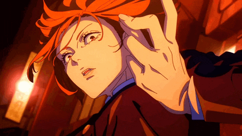a close up of a person 's face with a hand reaching out