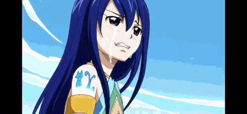 a girl with blue hair has a tattoo on her arm that says y2