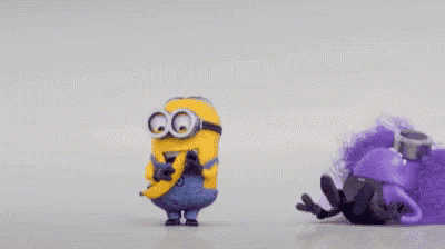 two minions , one yellow and one purple , are standing next to each other on a white surface .