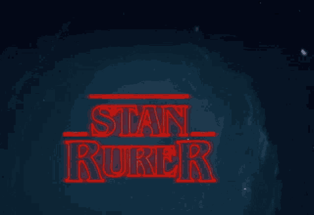 a sign that says stan rurer in red letters