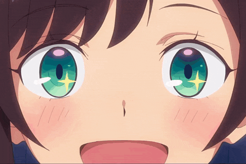 a close up of a girl 's eyes with a yellow star in them