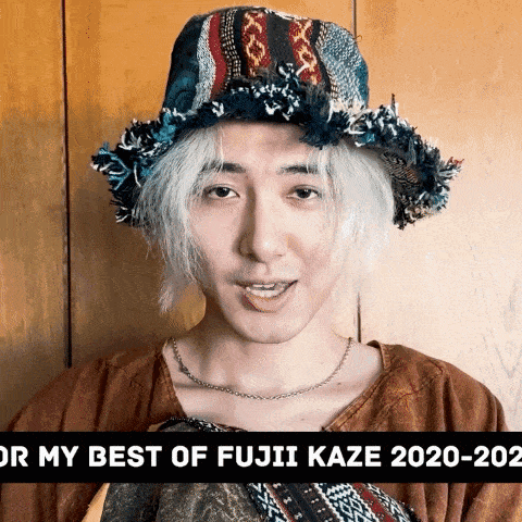 a man with white hair wearing a hat with the words for my best of fujii kaze 2020-2021