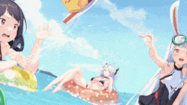 a girl in a bikini is laying on a float in the water
