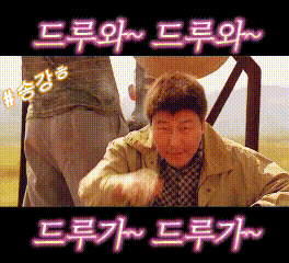 a man in a tan jacket is standing in front of a sign with chinese writing on it