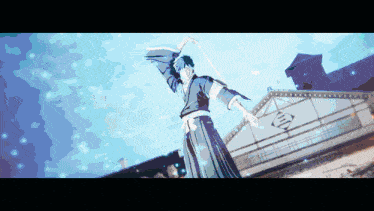 a man in a kimono is holding a sword in front of a building that has the letter i on it