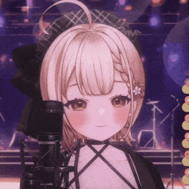 a girl with a flower in her ear is standing in front of a microphone and smiling