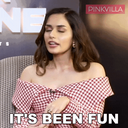 a woman says it 's been fun while sitting in front of a pinkvilla sign