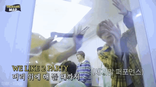 a group of people are standing in front of a glass wall with the words we like 2 party on the bottom