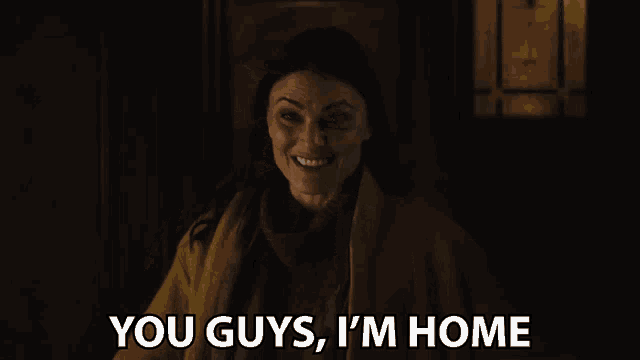 a woman in a yellow coat is saying you guys i 'm home