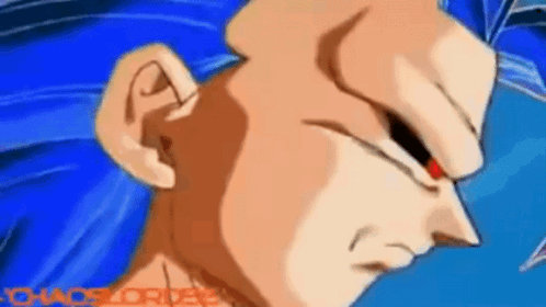 a close up of a person 's face with the word chaos written in orange