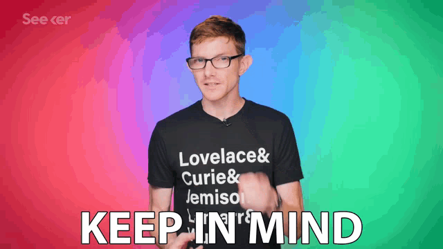 a man wearing a black shirt that says lovelace & curie & jemiso