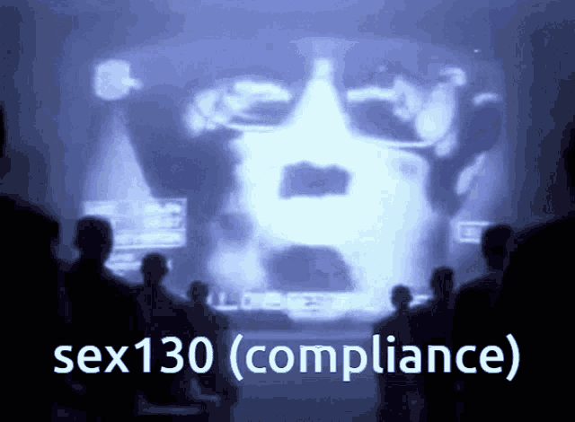 a group of people are looking at a screen that says sex130 compliance