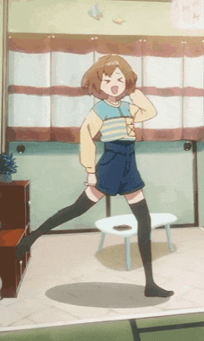 a girl is standing on one leg in a room with a table in the background .