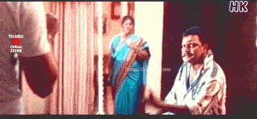 a screenshot of a telugu cinema zone showing a man and woman shaking hands