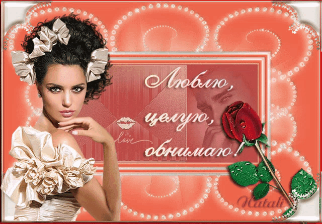 a woman in a white dress stands in front of a card that says " love "