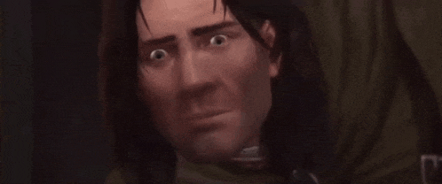 a close up of a cartoon character 's face with a surprised expression .
