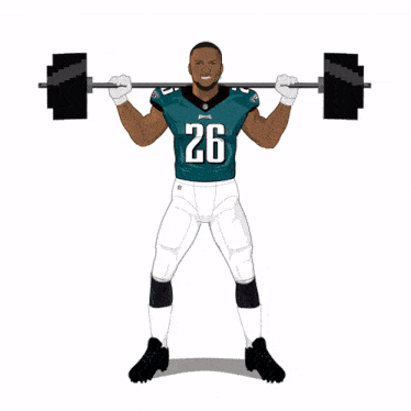 a football player with the number 26 on his jersey lifting a barbell