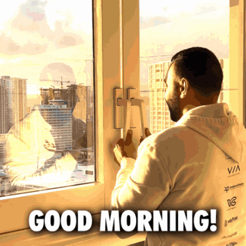a man looking out of a window with the words good morning written below him