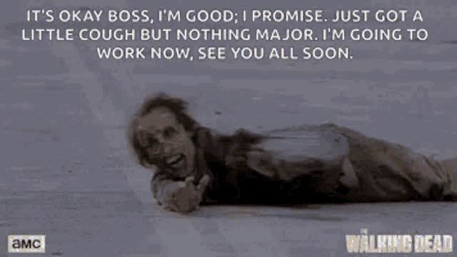 a man is laying on the ground with a quote from the walking dead on it .