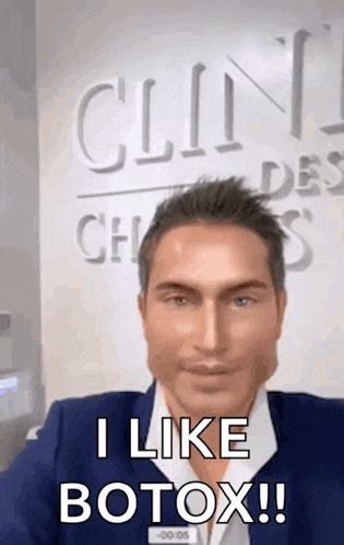 a man in a suit says " i like botox " in front of a sign