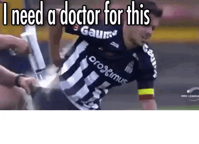 a soccer player is being tackled by another player while wearing a blue and white jersey .