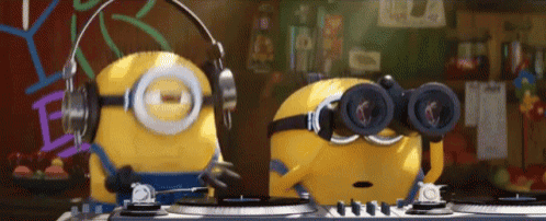 a couple of minions wearing headphones and goggles are playing music