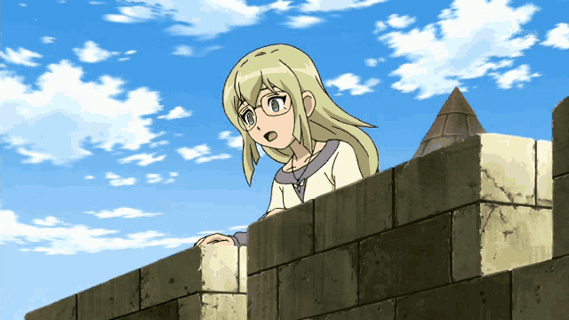 a girl with glasses looks over a stone wall