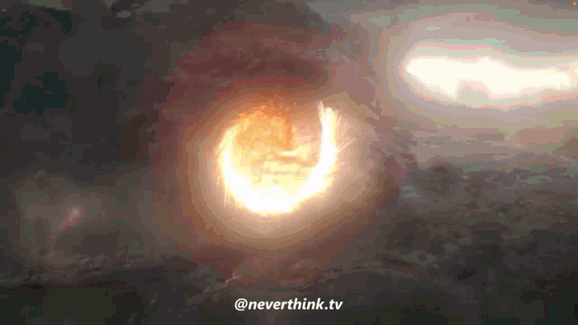 a picture of a fire with the words neverthink.tv written below it