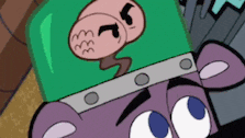 a cartoon character is wearing a green helmet with a monkey on it 's head .