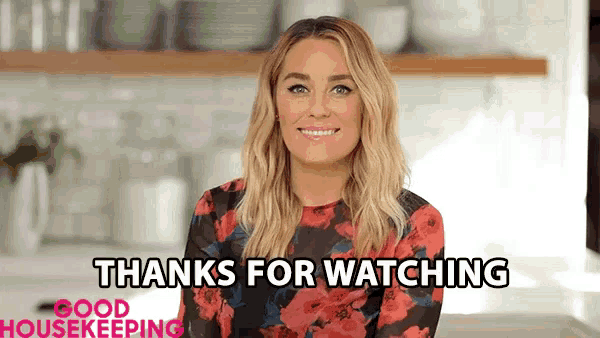 a woman says thanks for watching on a screen