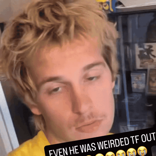 a close up of a man with the words even he was weirded tf out