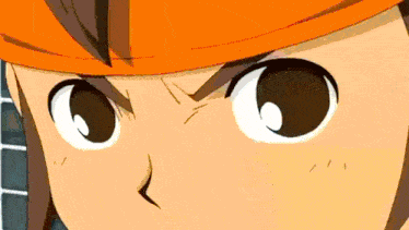 a close up of a cartoon character 's face with big eyes