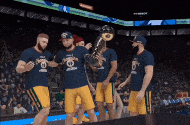 a group of basketball players holding a trophy that says ' champions ' on it