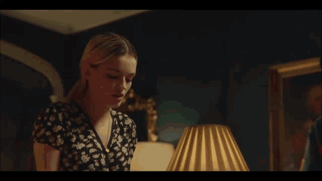 a boy and a girl are standing next to each other