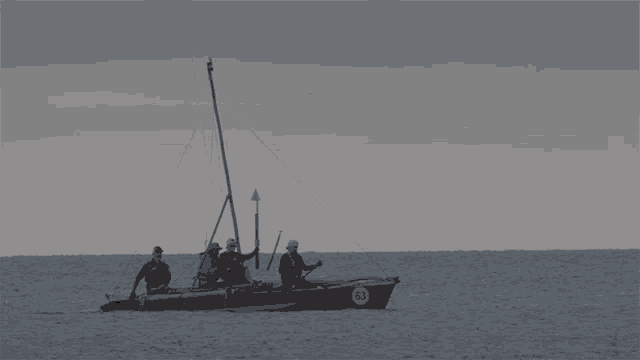 a boat with the number 63 on the side