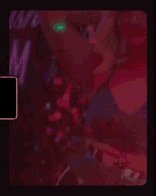 a blurry picture of a woman in a club with a purple background