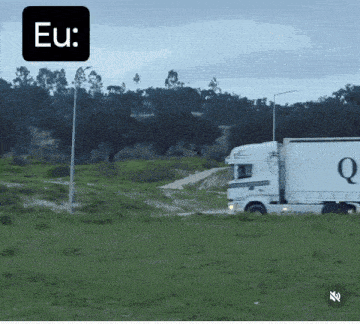 a white truck with the letter q on the side